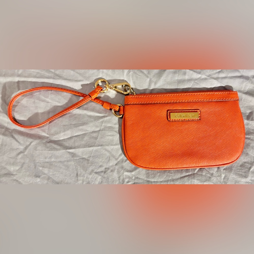 Calvin Klein small orange wristlet and bee wristlet